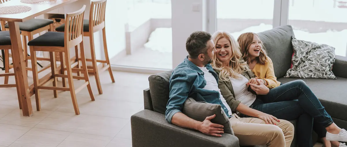 A family relaxing together on the couch